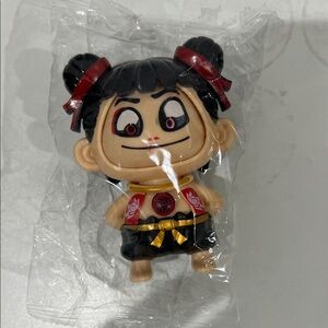 Cute Character Toy with Red and Black Accents